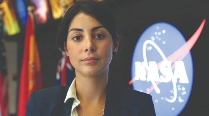 Headshot of Diana Trujillo in front of the NASA logo.