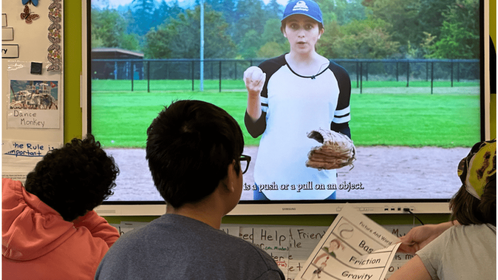 Learners watching a video about baseball - a multimodal learning approach to build background knowledge.